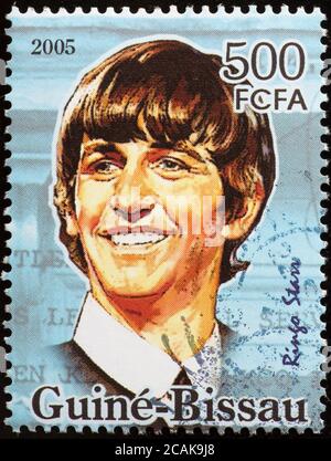 Ringo Starr on postage stamp of Guinea Bissau Stock Photo