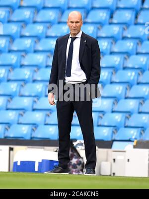 Real Madrid manager Zinedine Zidane looks on during the UEFA Champions League, round of 16, second leg match at the Etihad Stadium, Manchester. Stock Photo