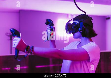 Man Streaming Multiplayer Online First Person Shooter on Pc while Gaming  Girl is Fighting in Virtual Reality Game Stock Photo - Image of headphones,  stream: 259471122