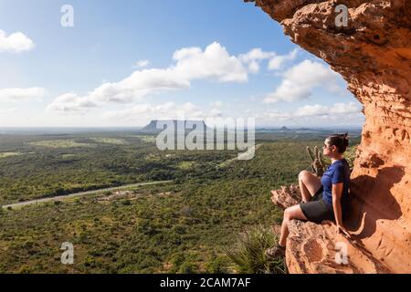 Girl at the top of Chapada's Portal - Carolina, Maranhao, Brazil Stock Photo