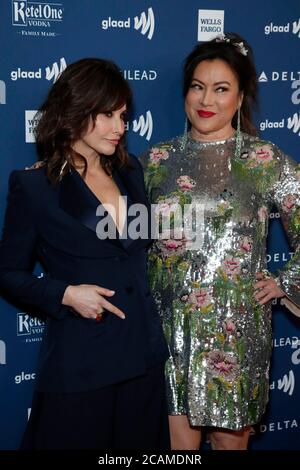 LOS ANGELES - MAR 28:  Gina Gershon, Jennifer Tilly at the 30th Annual GLAAD Media Awards at the Beverly Hilton Hotel on March 28, 2019 in Los Angeles, CA Stock Photo