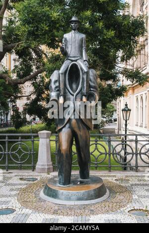 Prague, Czech Republic -  - July 11 2020: Statue of Franz Kafka Riding a Headless Figure by Jaroslav Rona near the Spanish Synagogue. Stock Photo