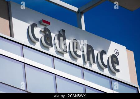 Cadence sign on company headquarters in Silicon Valley. Cadence is a multinational electronic design automation software and engineering services amer Stock Photo