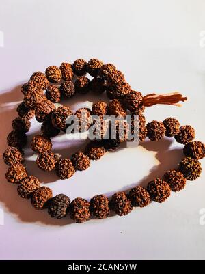 Japa Mala - Buddhist or Hindu prayer beads isolated on white Stock