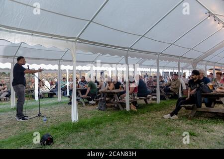 Northampton, UK. 06th Aug, 2020. Stand-up comedian, Nathan Caton plays The Comedy Crate's first socially distanced comedy show at The Black Prince. Credit: SOPA Images Limited/Alamy Live News Stock Photo