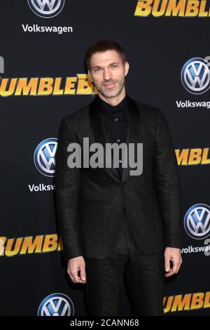 LOS ANGELES - DEC 9:  Travis Knight at the 'Bumblebee' World Premiere at the TCL Chinese Theater IMAX on December 9, 2018 in Los Angeles, CA Stock Photo