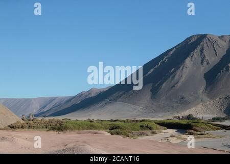 Atacama Desert and Camarones River Valley near sea, Arica, north Chile, South America evening 21 Oct 2017 Stock Photo