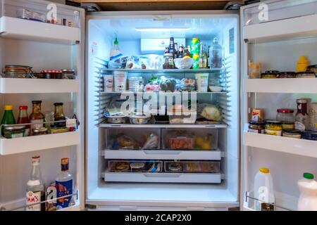 looking inside a large double fridge freezer Stock Photo