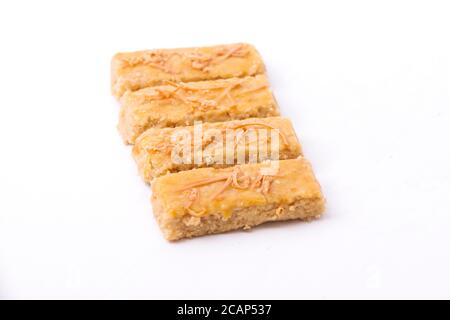 Kaasstengels or Kastengel  Kue Keju or Dutch Indonesian cheese stick cookies isolated on white background Stock Photo