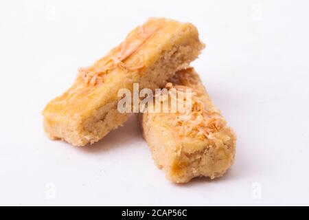 Kaasstengels or Kastengel  Kue Keju or Dutch Indonesian cheese stick cookies isolated on white background Stock Photo