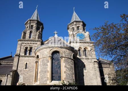 the unusual twin towers of holy trinity parish church claygate village surrey Stock Photo