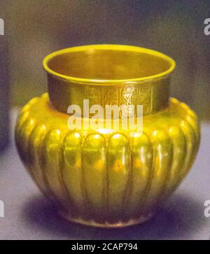 Egypt, Cairo, Egyptian Museum, dishes found in the royal necropolis of Tanis, burial of Psusennes : Gold vase with a heart-shaped belly. Stock Photo