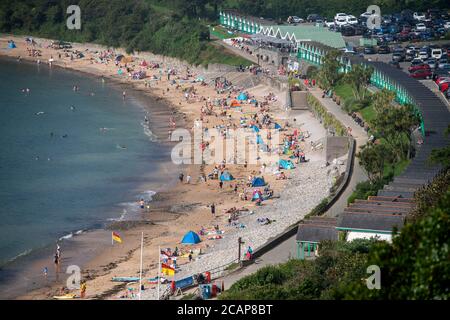 UK Weather, Langland Bay, Swansea, UK. 8th Aug, 2020. Packed beach at Langland Bay near Swansea this morning as people make the most of the sunny August sunshine. Credit: Phil Rees/Alamy Live News Stock Photo