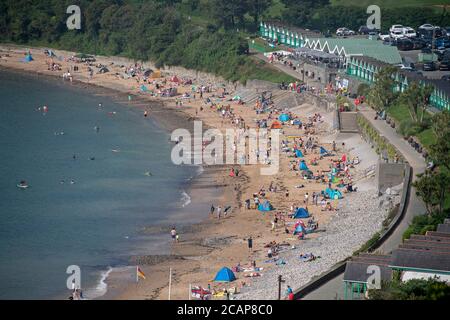 UK Weather, Langland Bay, Swansea, UK. 8th Aug, 2020. Packed beach at Langland Bay near Swansea this morning as people make the most of the sunny August sunshine. Credit: Phil Rees/Alamy Live News Stock Photo