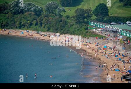 UK Weather, Langland Bay, Swansea, UK. 8th Aug, 2020. Packed beach at Langland Bay near Swansea this morning as people make the most of the sunny August sunshine. Credit: Phil Rees/Alamy Live News Stock Photo