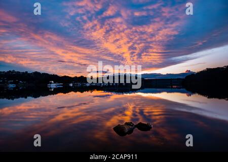 Amazing Sunset Sky over Georges River and Como Bridge Stock Photo