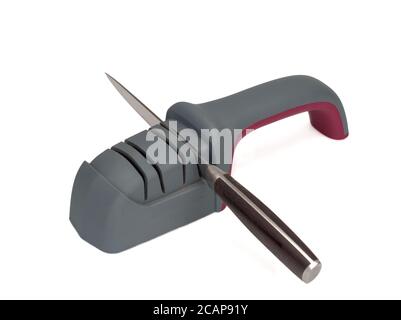 Knife sharpener ana a knife isolated on a white background.Top view. Stock Photo
