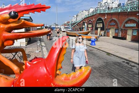 Brighton UK 8th August 2020 - A lovely morning for a stroll along Brighton seafront as the temperature is forecast to reach over 30 degrees in some parts of the South East : Credit Simon Dack / Alamy Live News Stock Photo