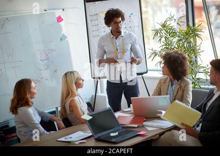Young people having business meeting in the office Stock Photo