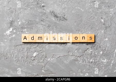 admissions word written on wood block. admissions text on table, concept. Stock Photo