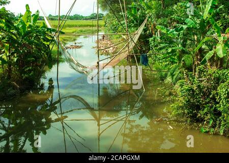 Bamboo fish-trap with a narrow neck - Bangladeshi traditional fishery tool Stock Photo