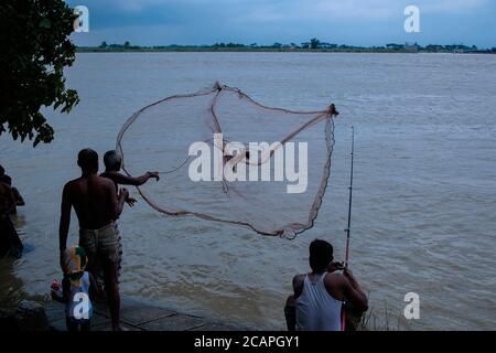 Padma of fishermen using coop-like trap catching fish in river,faridpur sadar,Bangladesh Stock Photo