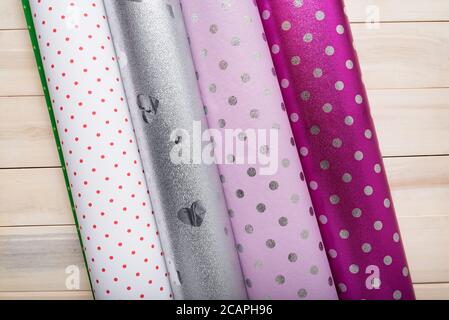 Several types of wrapping paper. Lilac polka dot silver Stock Photo