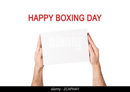 Happy boxing day. Box with white empty in male hands. White background Stock Photo