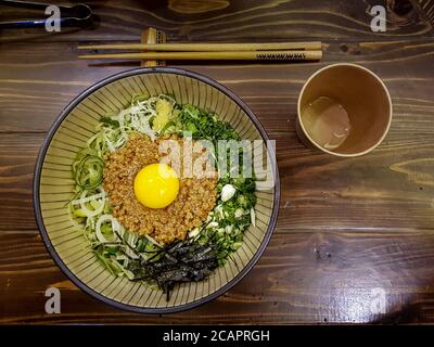 Mazesoba ramen, or Abura soba. Essentially ramen and toppings served with a small quantity of oily soy-based sauce. Japanese traditional food. Stock Photo