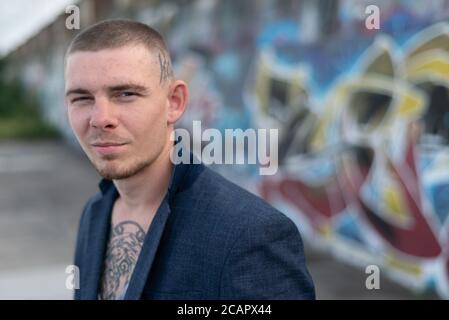 Portrait of a bully man in a blue jacket Stock Photo