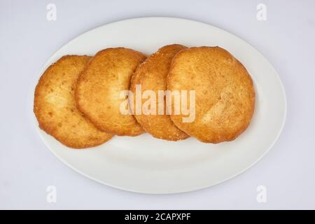 whites with meat on a white plate and white background Stock Photo