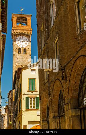 small alley and tower in Lucca Stock Photo