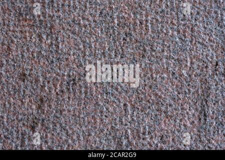 Roughly processed granite slab. Top view. Backgrounds and textures. Stock Photo