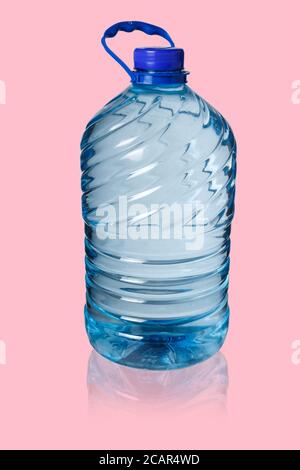 Big bottle of water on pink background, Five liters Stock Photo