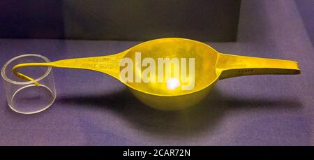 Cairo, Egyptian Museum, dishes found in the royal necropolis of Tanis, burial of Psusennes : Gold scoop with the end in the shape of a duck head. Stock Photo