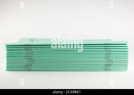 stack of thin student notebooks for elementary school Stock Photo