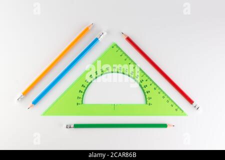 triangular ruler for studying at school isolated on a white background Stock Photo