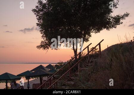 Summer Sunset in Berdiansk at the Embankment near the Azov Sea Stock Photo