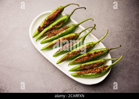 Bharwa Masala Mirch or Stuffed Green Chillies or Bharli Mirchi, Indian food Stock Photo