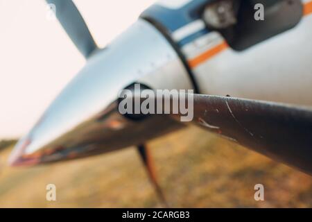Small private single engine propeller airplane with fly on blade at regional airport Stock Photo
