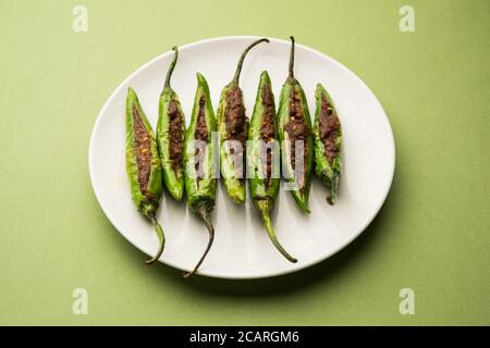 Bharwa Masala Mirch or Stuffed Green Chillies or Bharli Mirchi, Indian food Stock Photo