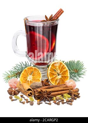 Hot red christmas mulled wine in glass with spices and fruits isolated on white background. Full depth of field with clipping path. Stock Photo