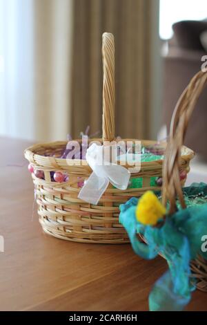 Children's Easter baskets decorated and prepared for Easter morning and the egg hunt and candy. Stock Photo
