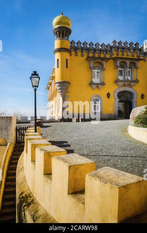 Sintra, Portugal - February 4, 2019: Exterior view of the Pena Palace, famous colorful castle from the romantic age in Sintra, Portugal, on february 4 Stock Photo