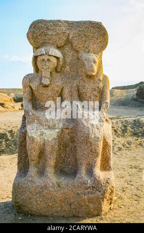 Egypt,Tanis, the  temple of Mut and Khonsu, previously called temple of Anta : Dyad of the King Ramses as god Khonsu, with his symbolic mother Mut. Stock Photo