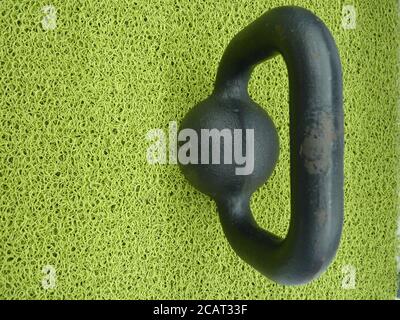 High angle shot of an old rusted weight Stock Photo