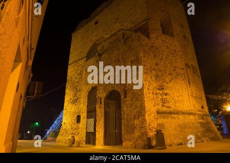 Porta Terra tower by night, Alghero Stock Photo