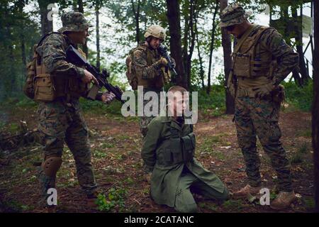 soldiers squad was capture alive terrorist and interrogation them on them on special tactics violent way Stock Photo - Alamy soldiers squad was capture alive terrorist and interrogation them on them on special tactics violent way Stock Photo - Alamy