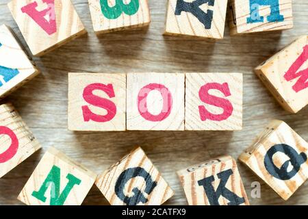 Alphabet letter with word SOS (abbreviation of save our soul/ship or ...