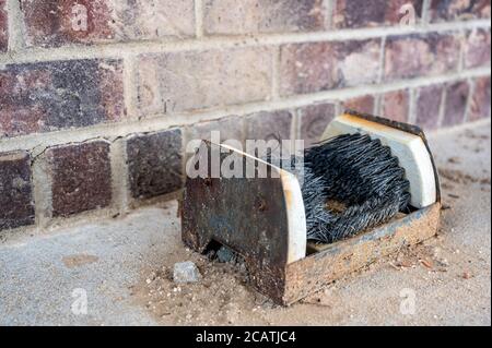 Tool used to remove dirt, dust, and mud from footwear Stock Photo